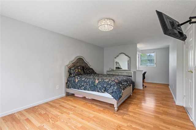 11 Shadow Ln, Gates, NY 14606 - bedroom with light wood finished floors and baseboards