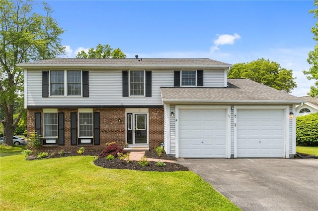 11 Shadow Ln, Gates, NY 14606 - view of front facade with asphalt driveway, a garage, a front yard, and brick siding