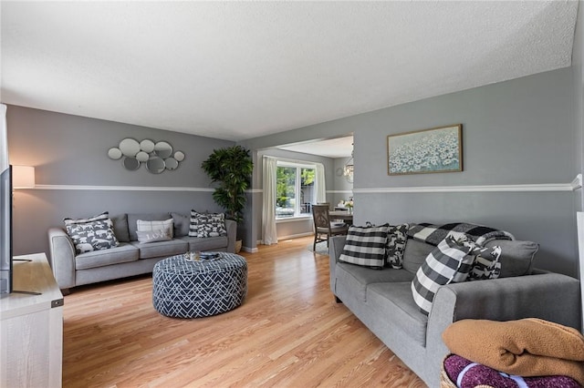 11 Shadow Ln, Gates, NY 14606 - living room with light wood-style flooring