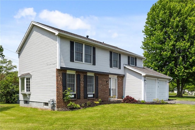 11 Shadow Ln, Gates, NY 14606 - view of front facade with a front lawn, driveway, and a garage
