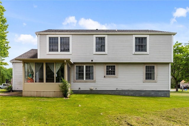 11 Shadow Ln, Gates, NY 14606 - rear view of property featuring a lawn and a sunroom