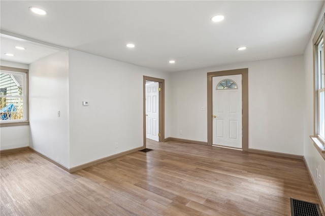 74 Clearview Rd, Greece, NY 14616 - spare room with light wood finished floors, baseboards, and recessed lighting
