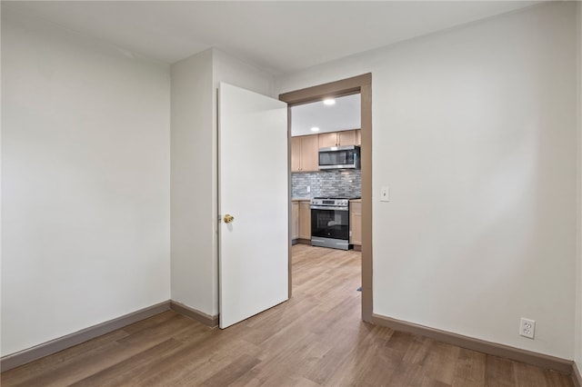74 Clearview Rd, Greece, NY 14616 - empty room with light wood-style flooring, baseboards, and recessed lighting
