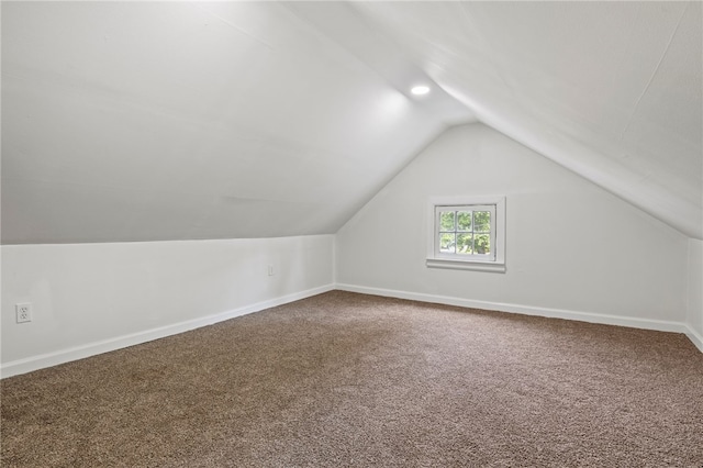74 Clearview Rd, Greece, NY 14616 - bonus room with lofted ceiling, carpet, and baseboards