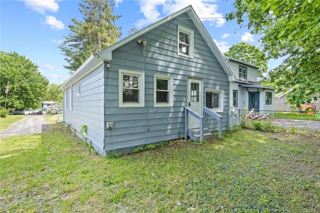74 Clearview Rd, Greece, NY 14616 - back of house with a yard