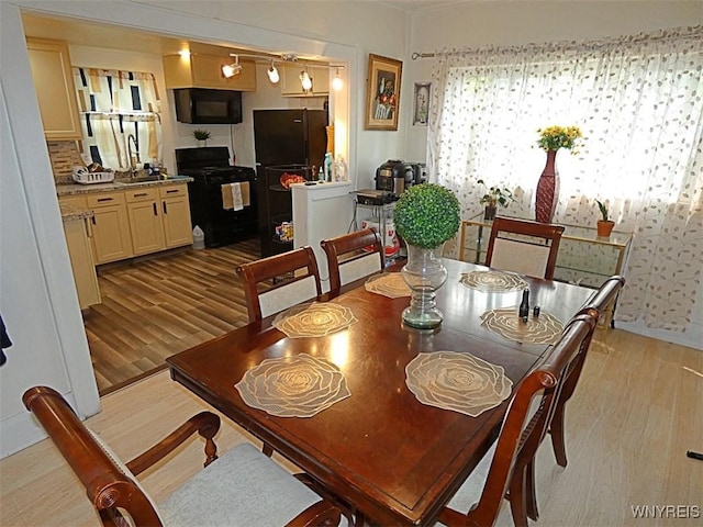 1862 Kenmore Ave, Buffalo, NY 14216 - dining area featuring light wood-style floors