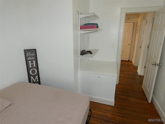1862 Kenmore Ave, Buffalo, NY 14216 - bedroom with dark wood-type flooring and baseboards