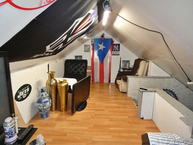 1862 Kenmore Ave, Buffalo, NY 14216 - additional living space featuring light wood-type flooring and vaulted ceiling