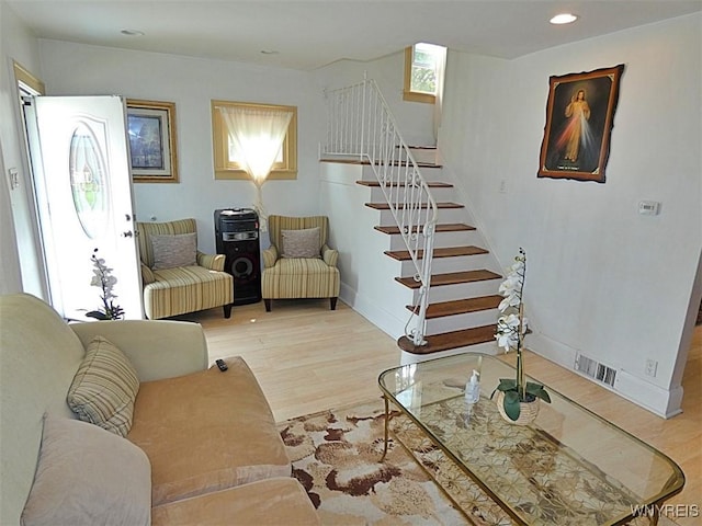 1862 Kenmore Ave, Buffalo, NY 14216 - living area with stairs, light wood-style floors, recessed lighting, and baseboards