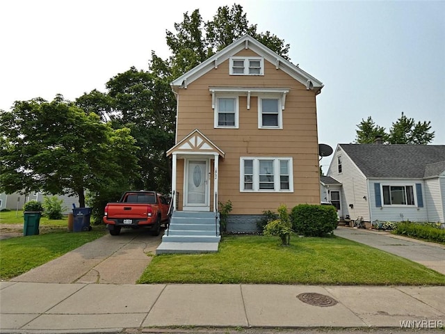 1862 Kenmore Ave, Buffalo, NY 14216 - view of front of property with a front lawn and concrete driveway