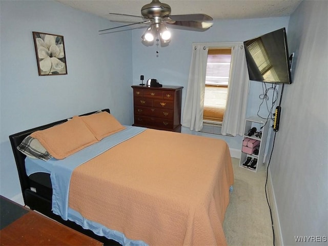 1862 Kenmore Ave, Buffalo, NY 14216 - bedroom with ceiling fan, light carpet, and baseboards
