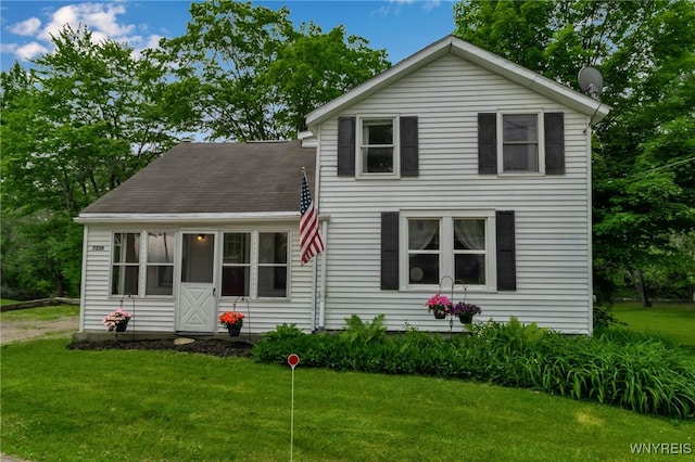 7228 Rapids Rd, Lockport-Town, NY 14094 - traditional-style home with a front lawn and a shingled roof