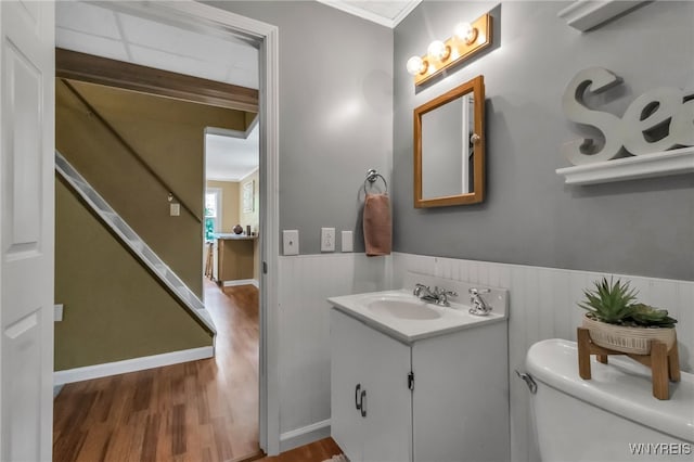 7228 Rapids Rd, Lockport-Town, NY 14094 - half bath featuring vanity, wood finished floors, wainscoting, toilet, and crown molding
