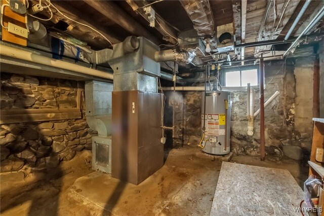 7228 Rapids Rd, Lockport-Town, NY 14094 - utility room featuring water heater and heating unit