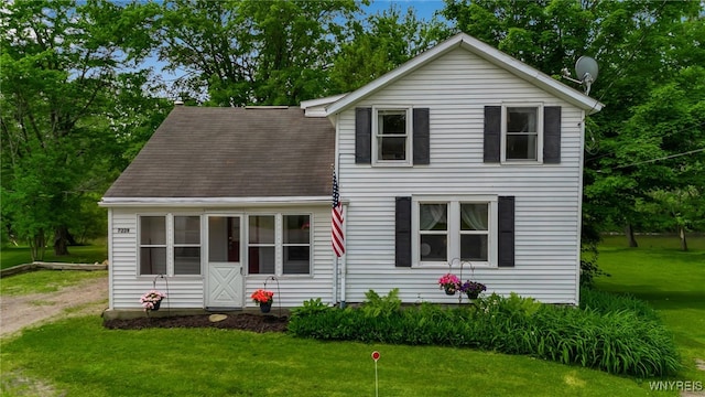 7228 Rapids Rd, Lockport-Town, NY 14094 - view of front facade featuring a front lawn and a shingled roof