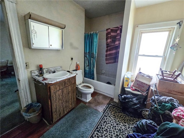 40 Grover St, Rochester, NY 14611 - bathroom featuring vanity, shower / bath combo with shower curtain, and toilet