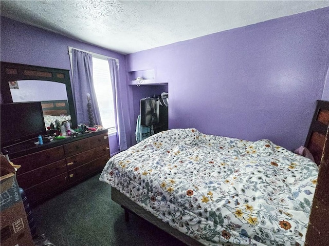 40 Grover St, Rochester, NY 14611 - carpeted bedroom with a textured ceiling