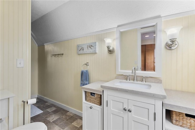 2203 State Route 14 N, Lyons, NY 14489 - bathroom with vanity, toilet, and baseboards