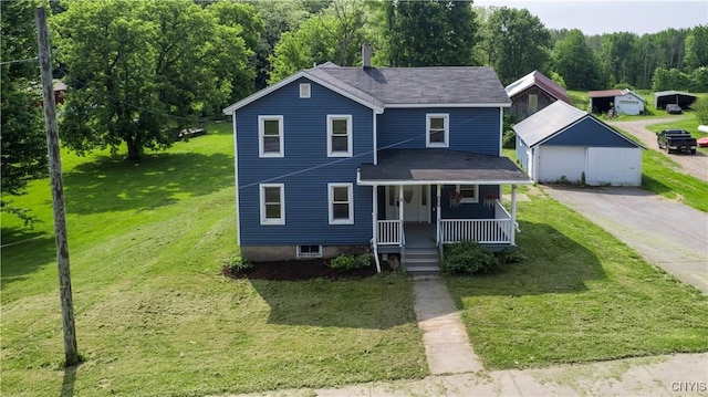 2630 E Main St, Ira, NY 13033 - view of front facade featuring covered porch, a front lawn, roof with shingles, and asphalt driveway