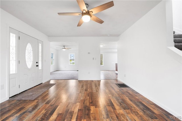 2630 E Main St, Ira, NY 13033 - entryway featuring hardwood / wood-style floors, ceiling fan, stairway, and baseboards