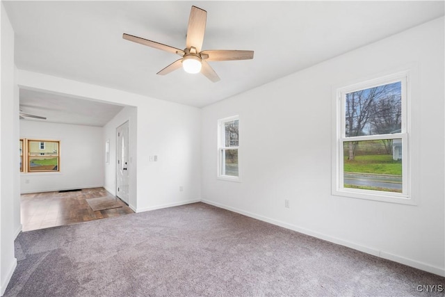 2630 E Main St, Ira, NY 13033 - spare room featuring carpet flooring, a ceiling fan, and baseboards