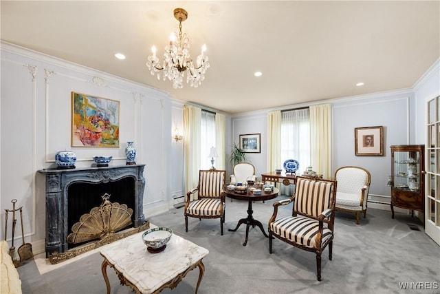88 Middlesex Rd, Buffalo, NY 14216 - living area featuring crown molding, a chandelier, recessed lighting, a high end fireplace, and light carpet
