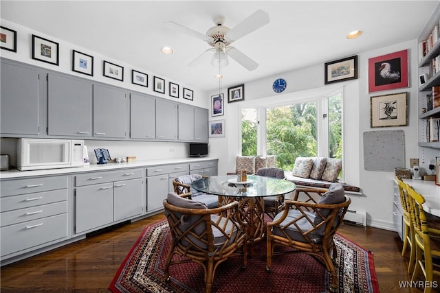 88 Middlesex Rd, Buffalo, NY 14216 - dining space featuring a ceiling fan, recessed lighting, dark wood-type flooring, and a baseboard heating unit