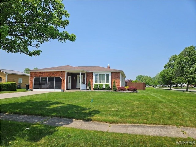 1 Woodstream Dr, Lancaster, NY 14086 - single story home featuring a garage, driveway, a chimney, brick siding, and a front lawn