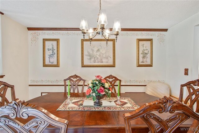 1 Woodstream Dr, Lancaster, NY 14086 - dining room with a chandelier, a textured ceiling, and crown molding