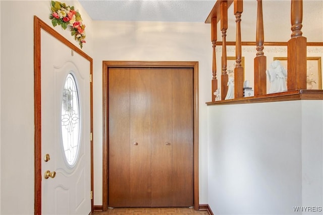 1 Woodstream Dr, Lancaster, NY 14086 - entryway featuring baseboards