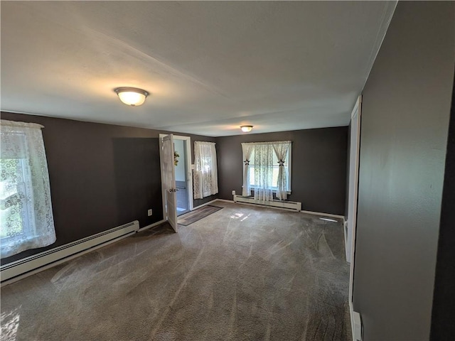 135 Hedgehog Ln, Bradford Town, PA 16701 - spare room featuring a baseboard radiator, carpet, and baseboards