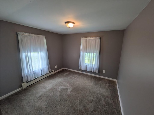 135 Hedgehog Ln, Bradford Town, PA 16701 - carpeted empty room featuring baseboard heating and baseboards