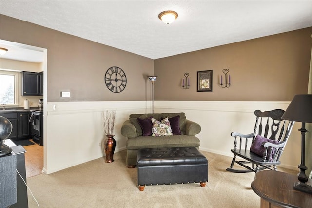 439 Red Apple Ln, Greece, NY 14612 - living area featuring light colored carpet and baseboards