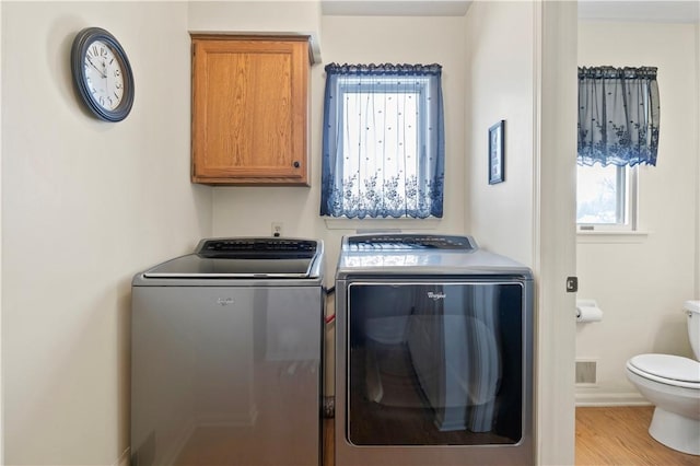 439 Red Apple Ln, Greece, NY 14612 - laundry room featuring washing machine and clothes dryer, wood finished floors, and baseboards