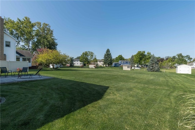 439 Red Apple Ln, Greece, NY 14612 - view of yard featuring a patio and a residential view