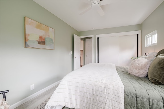 237 Heberle Rd, Irondequoit, NY 14609 - bedroom with wood finished floors, a closet, baseboards, and ceiling fan