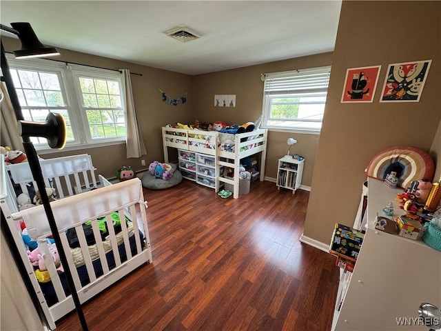 57 Brookdale Dr, Amherst, NY 14221 - bedroom with wood finished floors and baseboards
