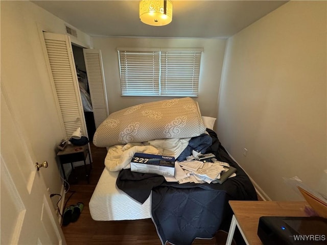 57 Brookdale Dr, Amherst, NY 14221 - bedroom with wood finished floors and a closet