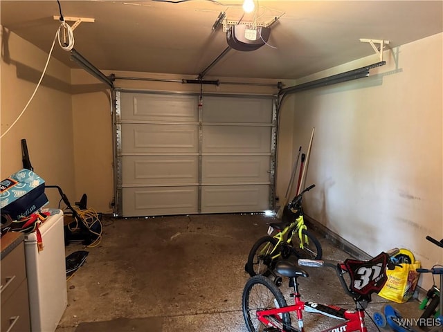 57 Brookdale Dr, Amherst, NY 14221 - garage featuring a garage door opener
