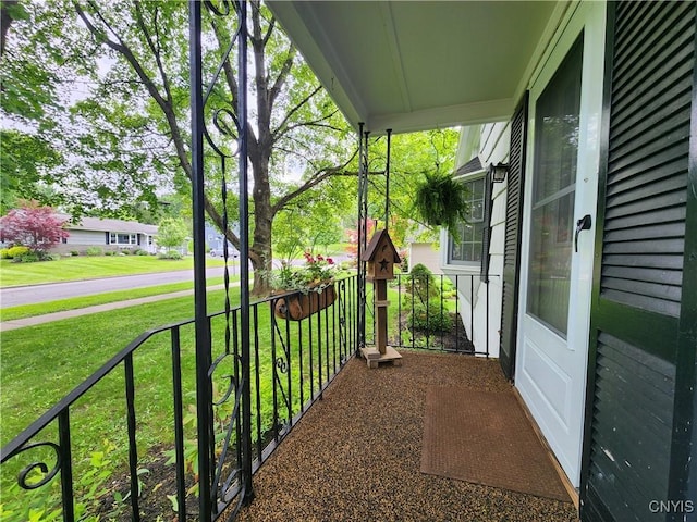 70 W Elizabeth St, Skaneateles, NY 13152 - covered porch featuring a lawn