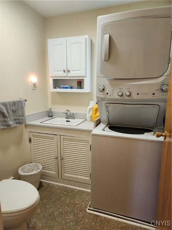 70 W Elizabeth St, Skaneateles, NY 13152 - laundry room with stacked washer / drying machine