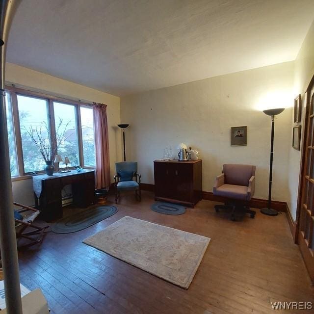 50 Gualbert Ave, Cheektowaga, NY 14211 - living area featuring wood-type flooring and baseboards