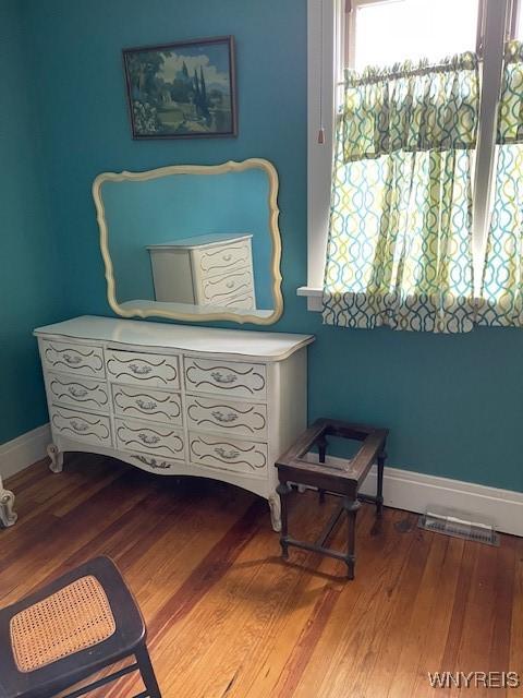 50 Gualbert Ave, Cheektowaga, NY 14211 - bedroom featuring wood finished floors and baseboards