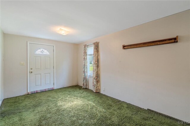 8278 Maple Rd, Clay, NY 13041 - foyer featuring light colored carpet and healthy amount of natural light