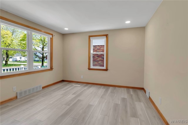 49 Central Blvd, Cheektowaga, NY 14225 - unfurnished room featuring light wood finished floors, baseboards, and recessed lighting