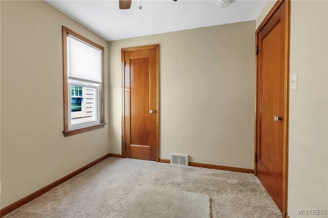 49 Central Blvd, Cheektowaga, NY 14225 - empty room featuring a ceiling fan, carpet flooring, and baseboards