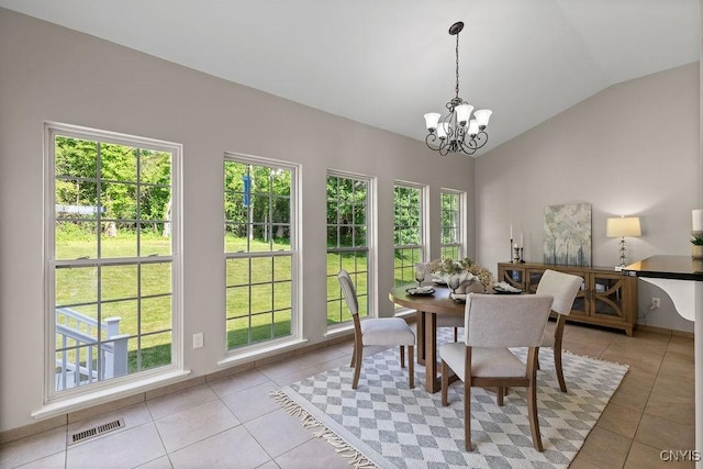 163 Golden Meadows Way, Camillus, NY 13164 - dining space with light tile patterned floors, a chandelier, and vaulted ceiling