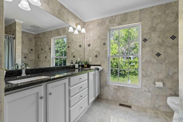 163 Golden Meadows Way, Camillus, NY 13164 - full bath with double vanity, ornamental molding, a tile shower, toilet, and tile walls