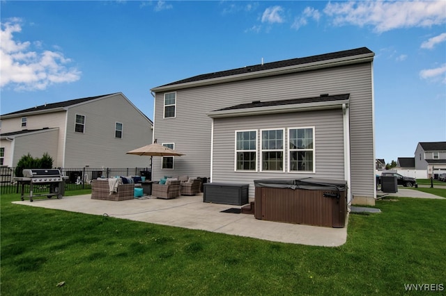 123 Stonebridge Rd, Grand Island, NY 14072 - back of property with a hot tub, outdoor lounge area, a patio, and central AC