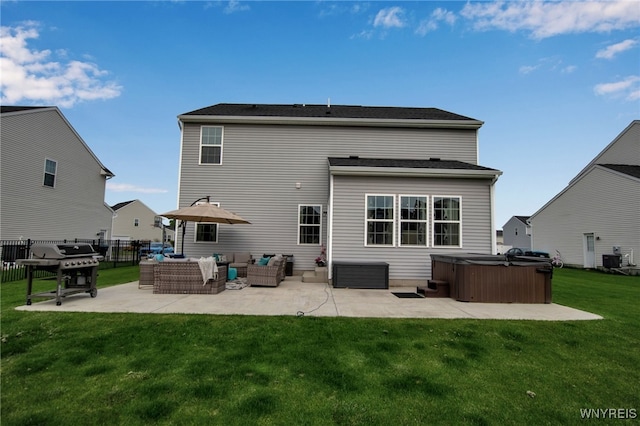 123 Stonebridge Rd, Grand Island, NY 14072 - rear view of house featuring a hot tub, a patio, and an outdoor hangout area